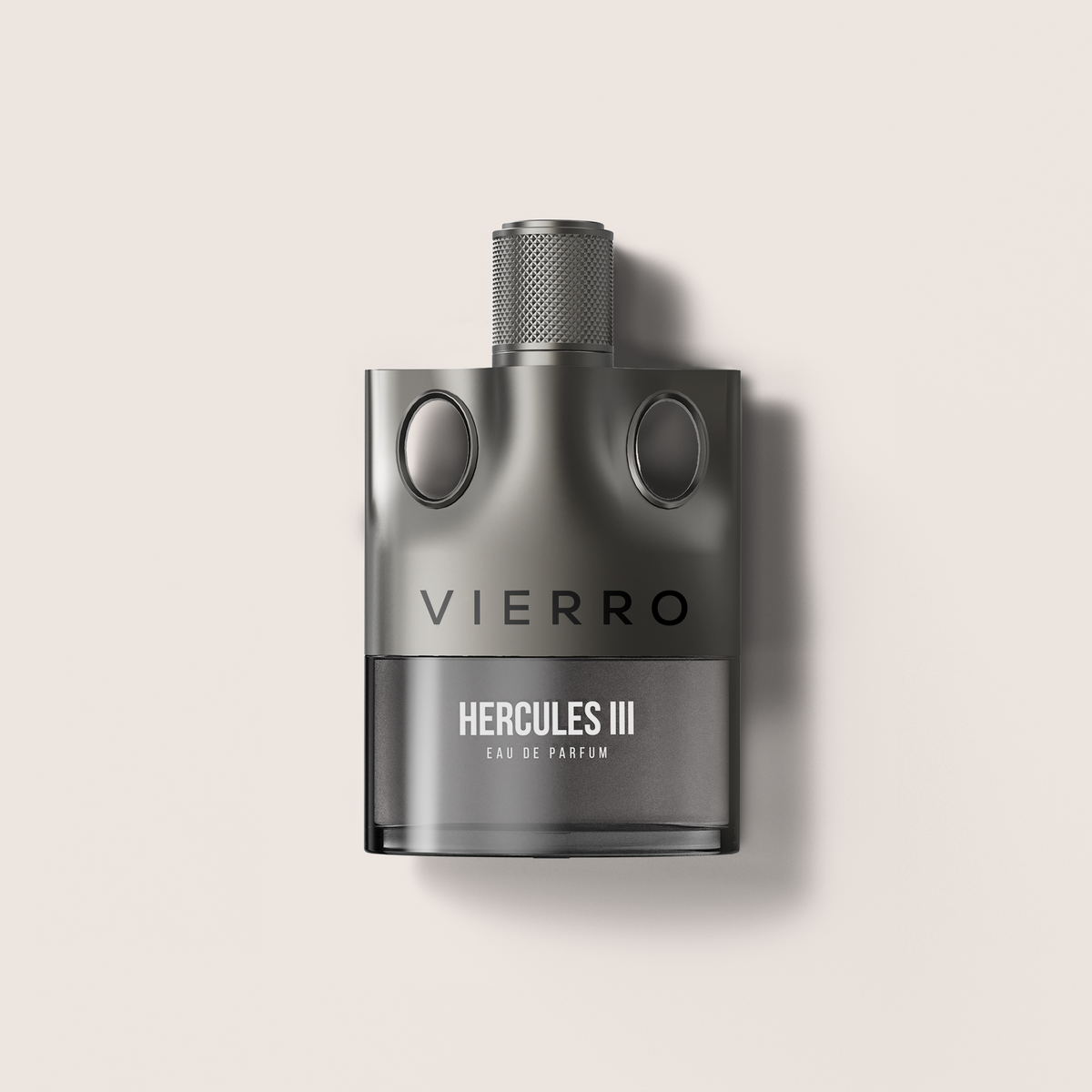 A matte dark gray bottle of Vierro Hercules III Eau de Parfum, featuring a textured metallic cap and a clean, modern design, set against a solid light beige background with a soft shadow.